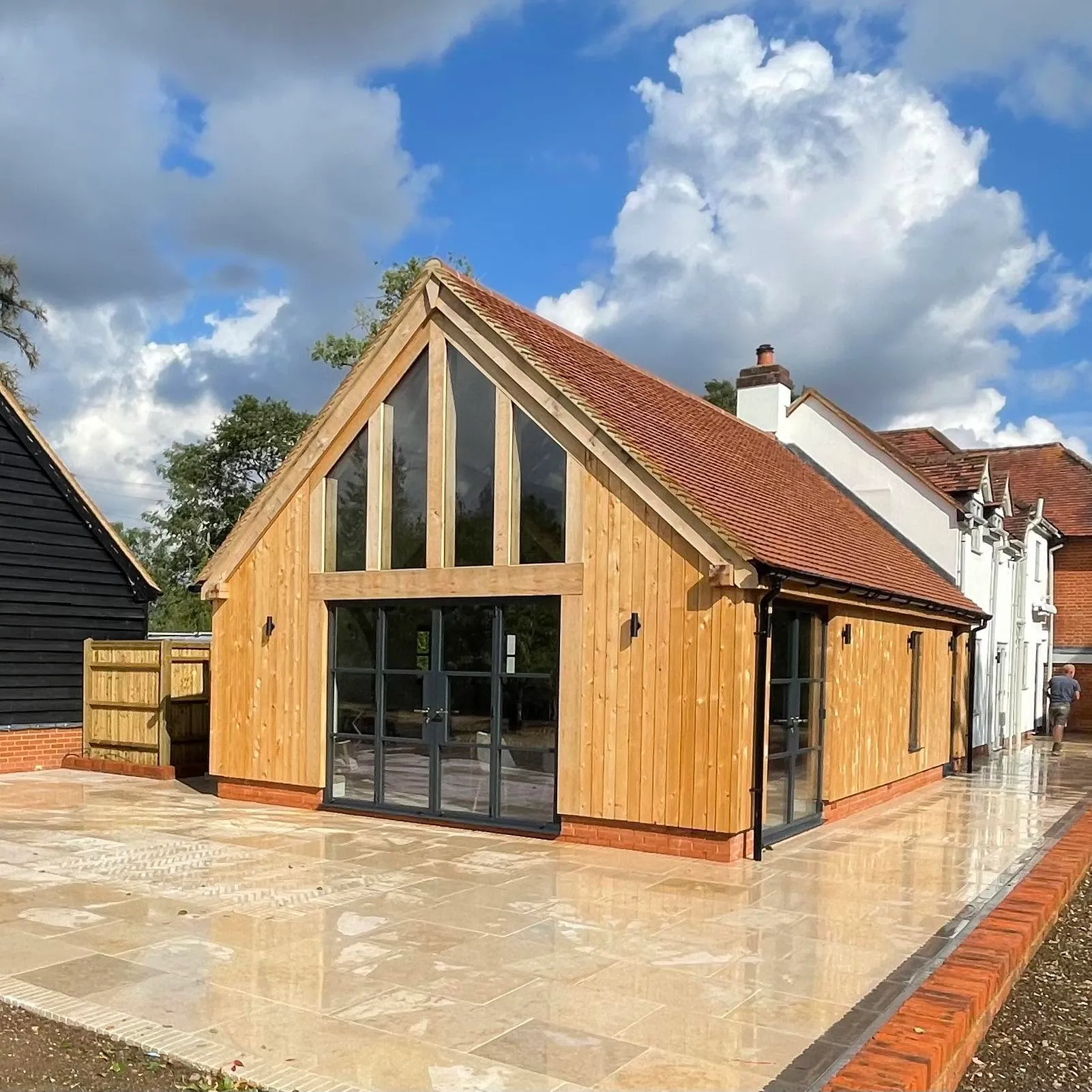 Finished glazed-gable oak framed kitchen extension with new patio